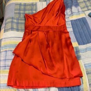 Orange BCBG one shoulder cocktail dress.